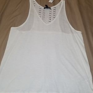 White sleeveless top